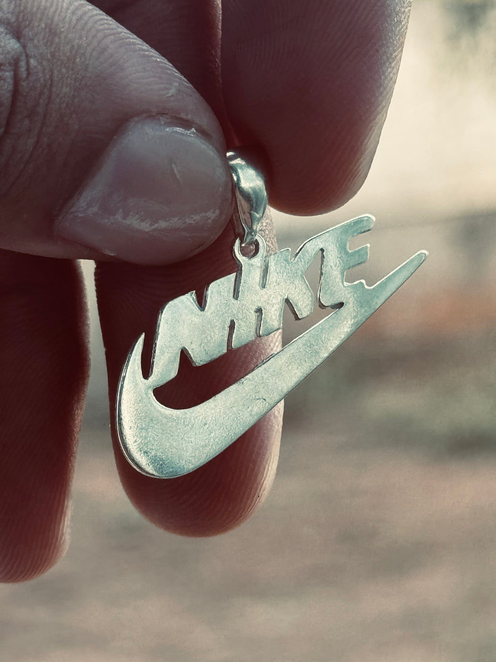 Pigente Nike medio